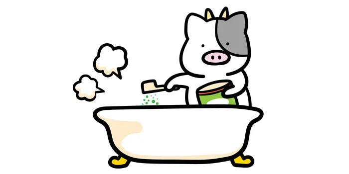 お風呂に入浴剤を入れている牛のイラスト