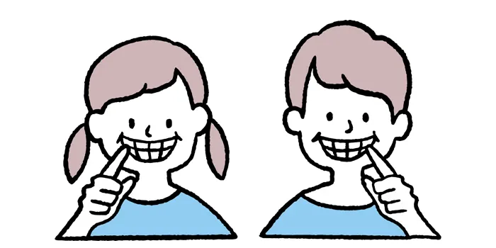 歯を出して笑っている男女のイラスト